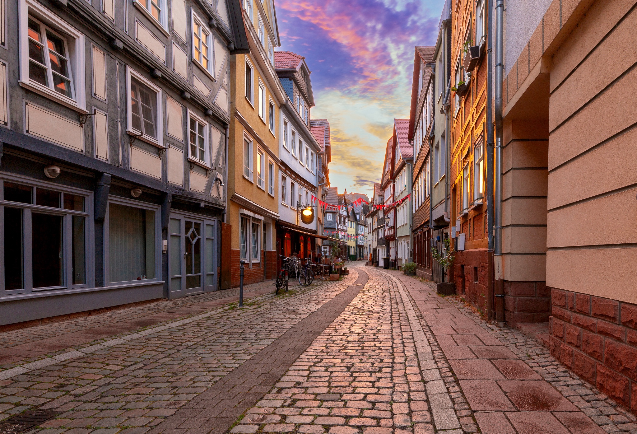 marburg. old medieval street in the historical center at sunset.